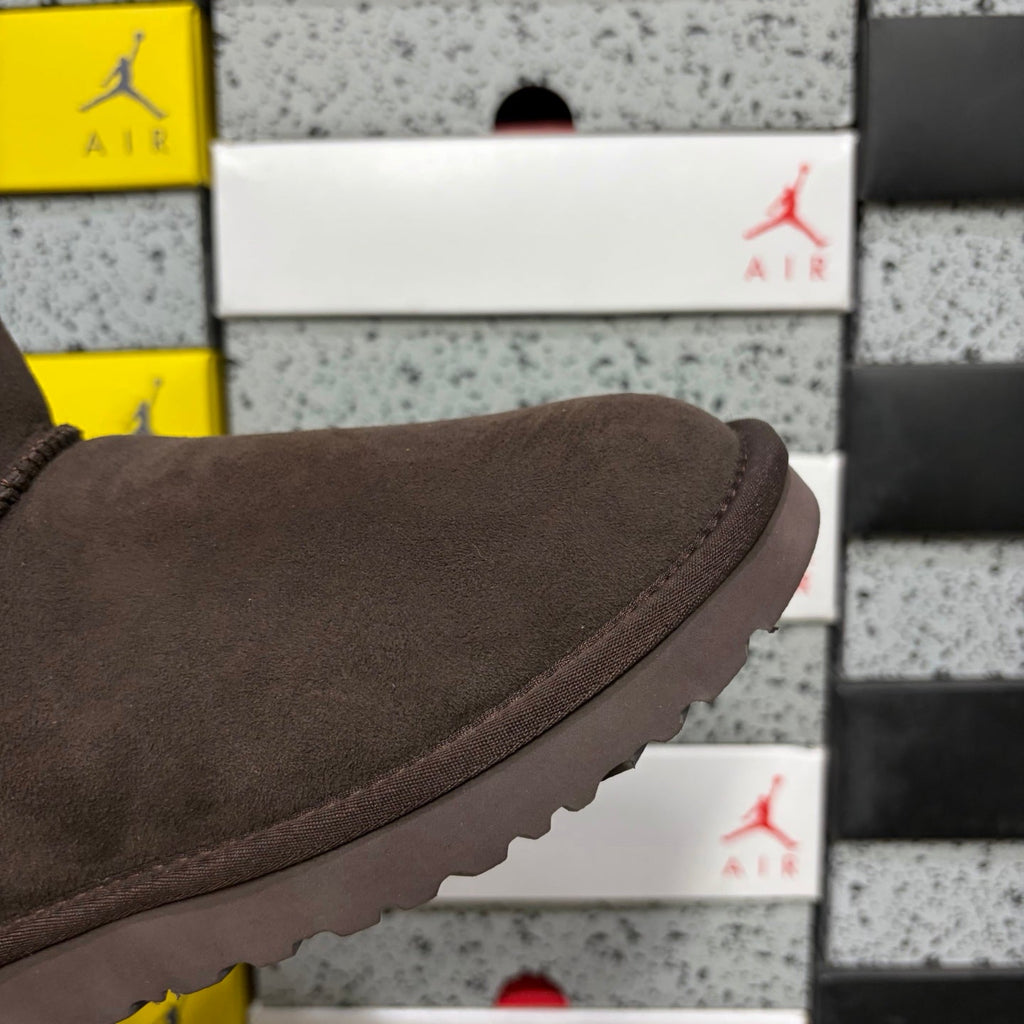 UGG Mini Bailey Bow Ankle Boot – Suede Boot with Tonal Dark Shearling Lining, Chocolate Satin Bow & Dark Sugar Sole in Chocolate