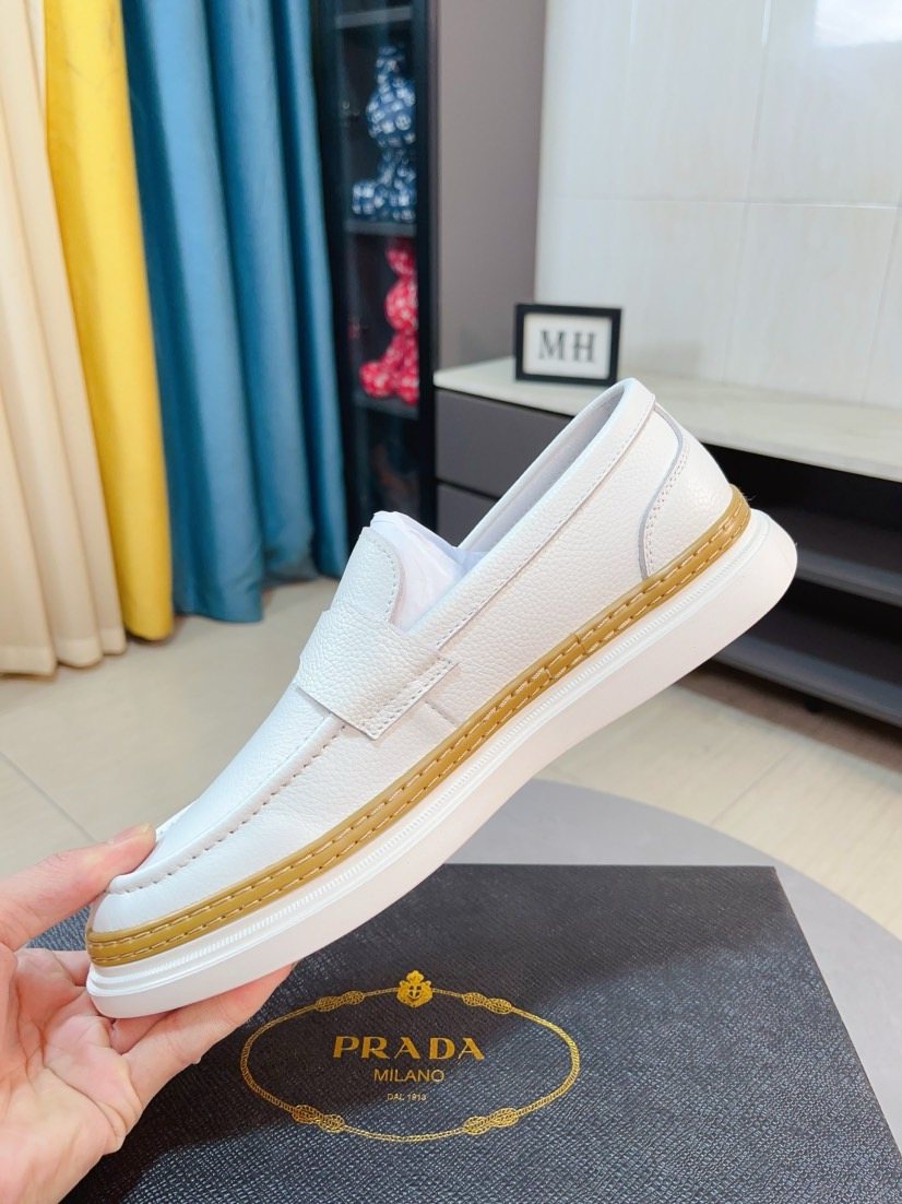 Prada Textured Slip-On Shoes